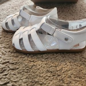 Brand new pair of UGG sandals size 11
